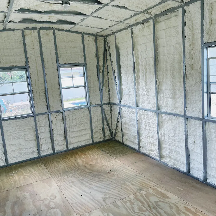 Closed-cell spray foam insulation applied to wall cavities in a residential project in Robstown
